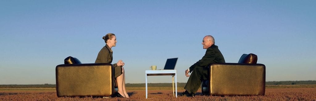 volunteer-business-meeting-outside-field